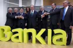 Pay slashed for bailed-out Spanish bankers