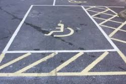Woman fined under Spain's gag law after posting pic of cop car in handicapped spot Woman fined under Spain's gag law after posting pic of cop car in handicapped spot