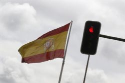 Spain seeks to restore calm after S&P downgrade