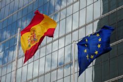 Spain details deep spending cuts as public anger grows