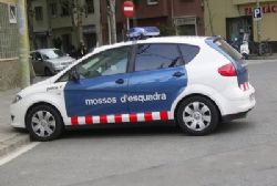 Cabinet spares violent Catalan police officers