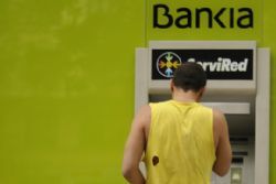 Spanish court calls top bank chairmen in Bankia probe